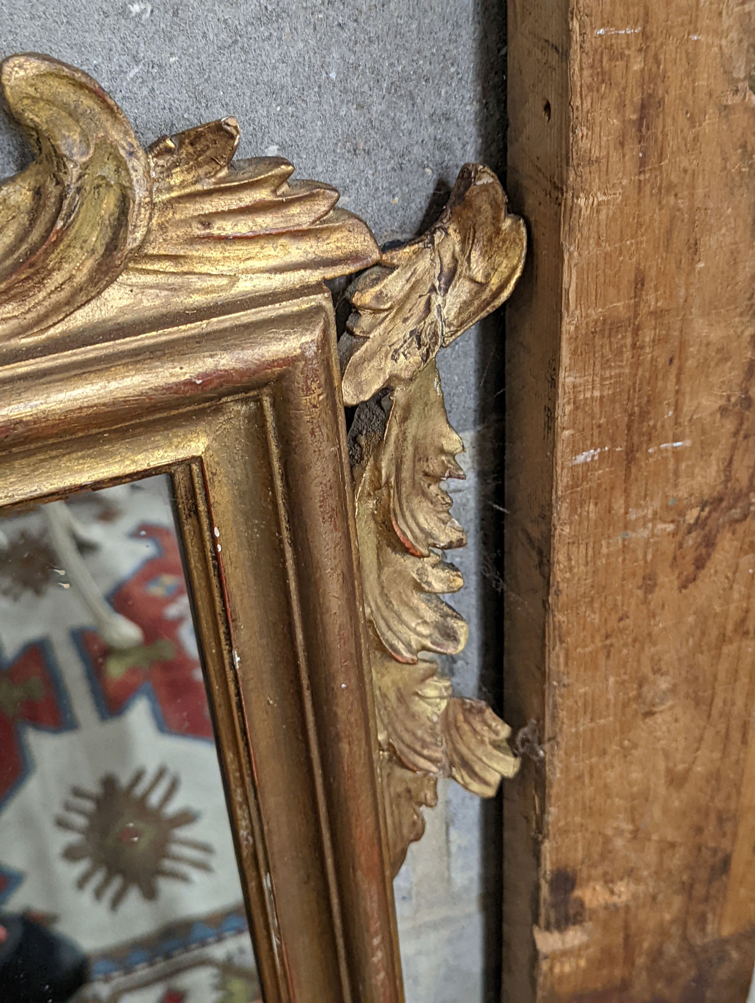 A 1930's French carved giltwood wall mirror, width 80cm